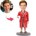 man-holding-mug-bobblehead