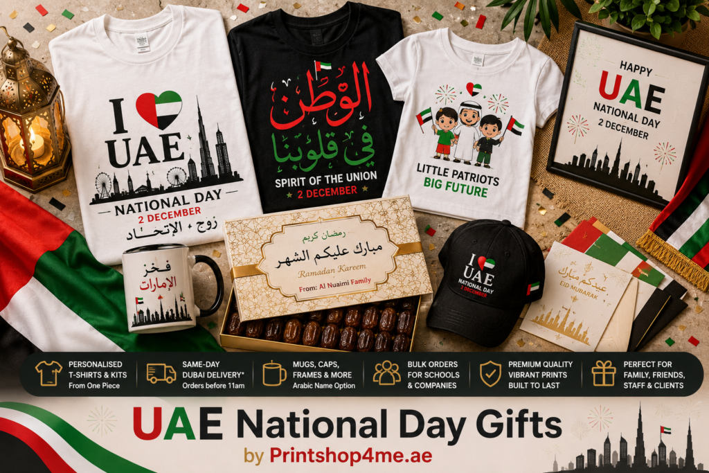 UAE National Day gifts — family matching t-shirts, personalised mug, cap, and dates gift box on a marble countertop.