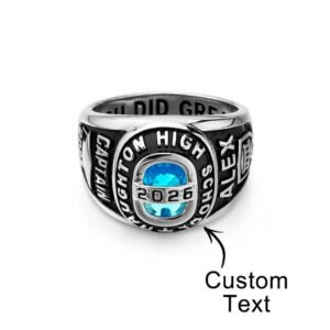 Personalized silver graduation class ring featuring a round blue birthstone at the center, custom graduation year, school name, and engraved side details. This customizable class ring allows personalized text, making it a meaningful graduation keepsake for high school or college graduates.