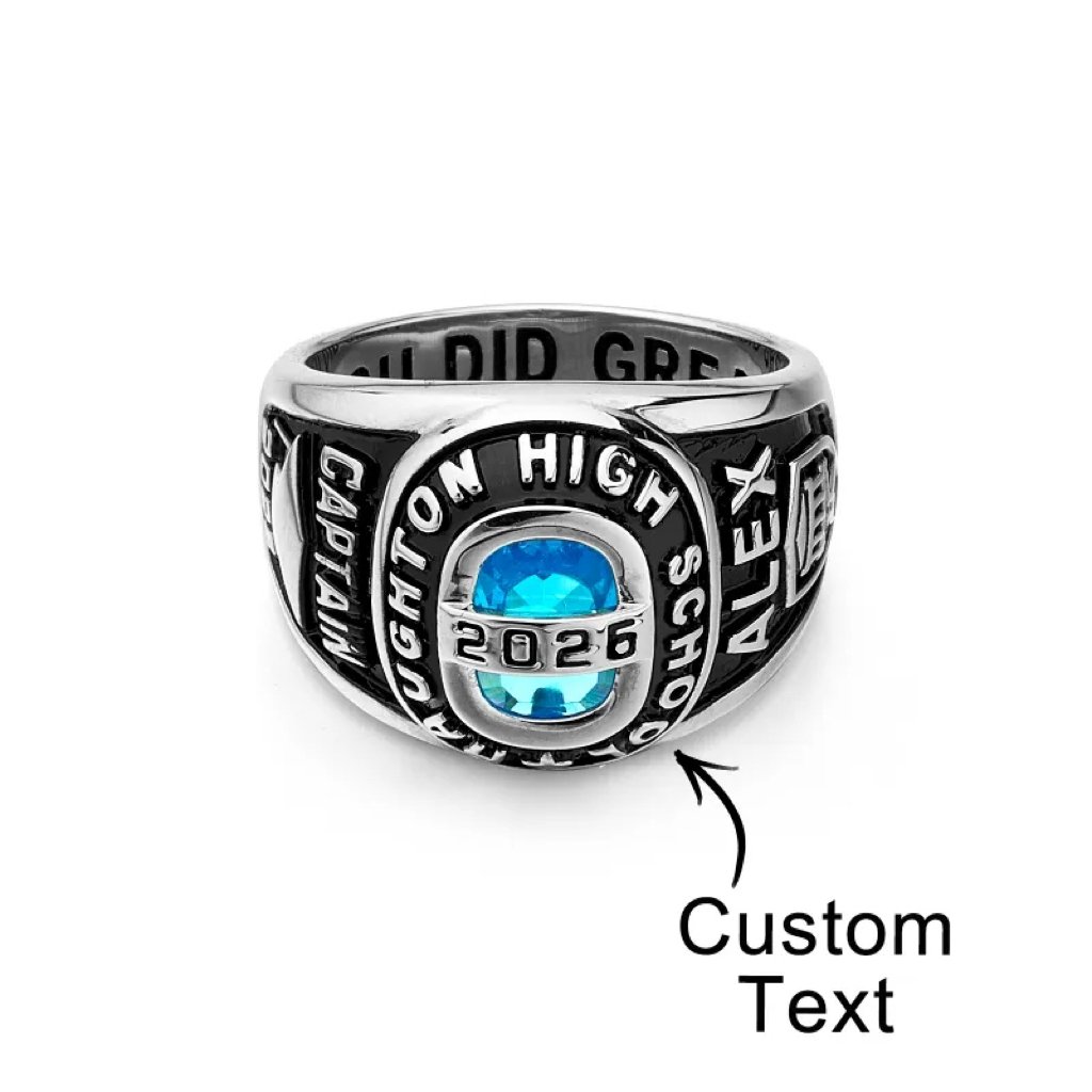 17296bf8-f585-4d06-82fb-6c22f5e0cb17-0jpeg - printshop4me.ae Personalized silver graduation class ring featuring a round blue birthstone at the center, custom graduation year, school name, and engraved side details. This customizable class ring allows personalized text, making it a meaningful graduation keepsake for high school or college graduates.