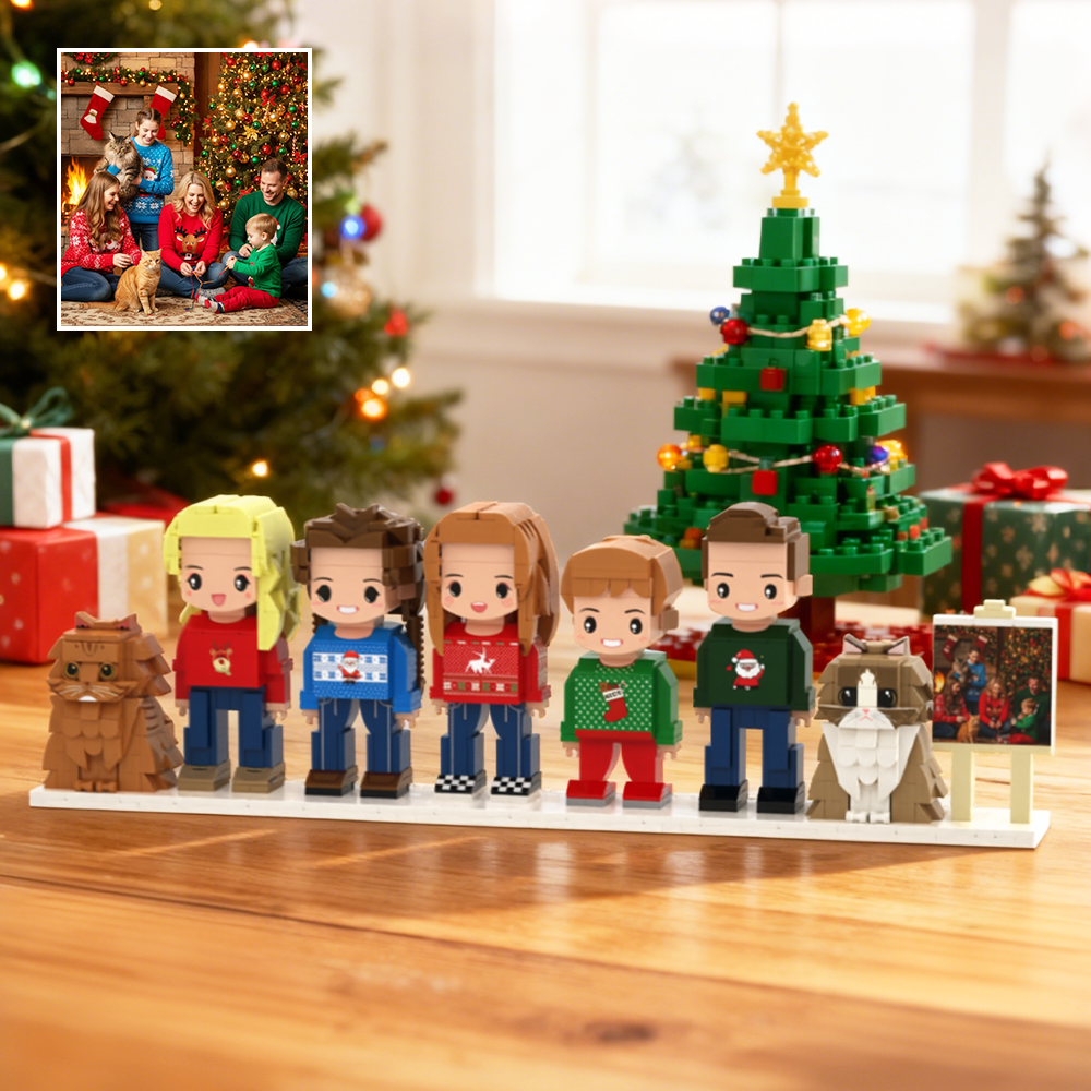 2c379386-01b7-45ee-8ea0-4b1fee108b55-0png - printshop4me.ae Personalized custom brick figure family set featuring five people and two cats, recreated from a family photo and displayed on a festive Christmas-themed base with a decorated brick Christmas tree, wrapped gifts, and miniature printed photo. A heartwarming holiday keepsake designed from a custom family picture.