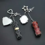 Personalized crystal keychain set featuring heart-shaped and oval photo lockets paired with wire-wrapped crystal point pendants. The silver-tone keychains include heart and star clasps with decorative bow charms, while the crystals are available in black and rose pink. Displayed on a black background, these custom engraved keepsake keychains make thoughtful gifts for birthdays, anniversaries, bridesmaids, or loved ones.