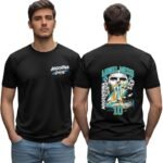 Front and back view of a black Argentina soccer-themed T-shirt featuring “Argentina 2026” text on the front and a vibrant Lionel Messi graphic with the Argentina flag and the number 10 on the back. Model wearing jeans, standing with hands in pockets, back view shows detailed Messi illustration.