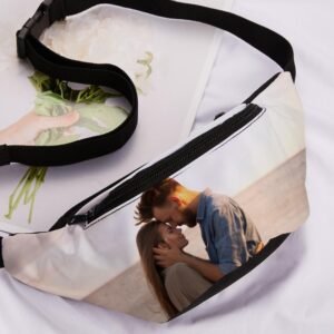 BAG228jpg - printshop4me.ae Personalized photo waist bag with an adjustable black strap and zippered compartment, featuring a custom printed romantic couple photo on the front. This custom fanny pack is a meaningful gift for couples, perfect for travel, daily use, anniversaries, Valentine's Day, birthdays, and special occasions.