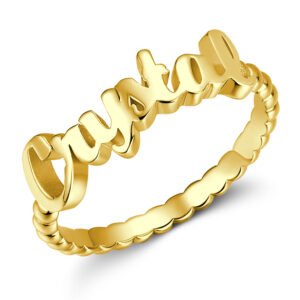 Personalized custom name ring in polished gold with a stylish script name design and a decorative beaded band. This elegant engraved name ring is a meaningful piece of personalized jewelry, making a thoughtful gift for women on birthdays, anniversaries, Valentine's Day, Mother's Day, weddings, or other special occasions.