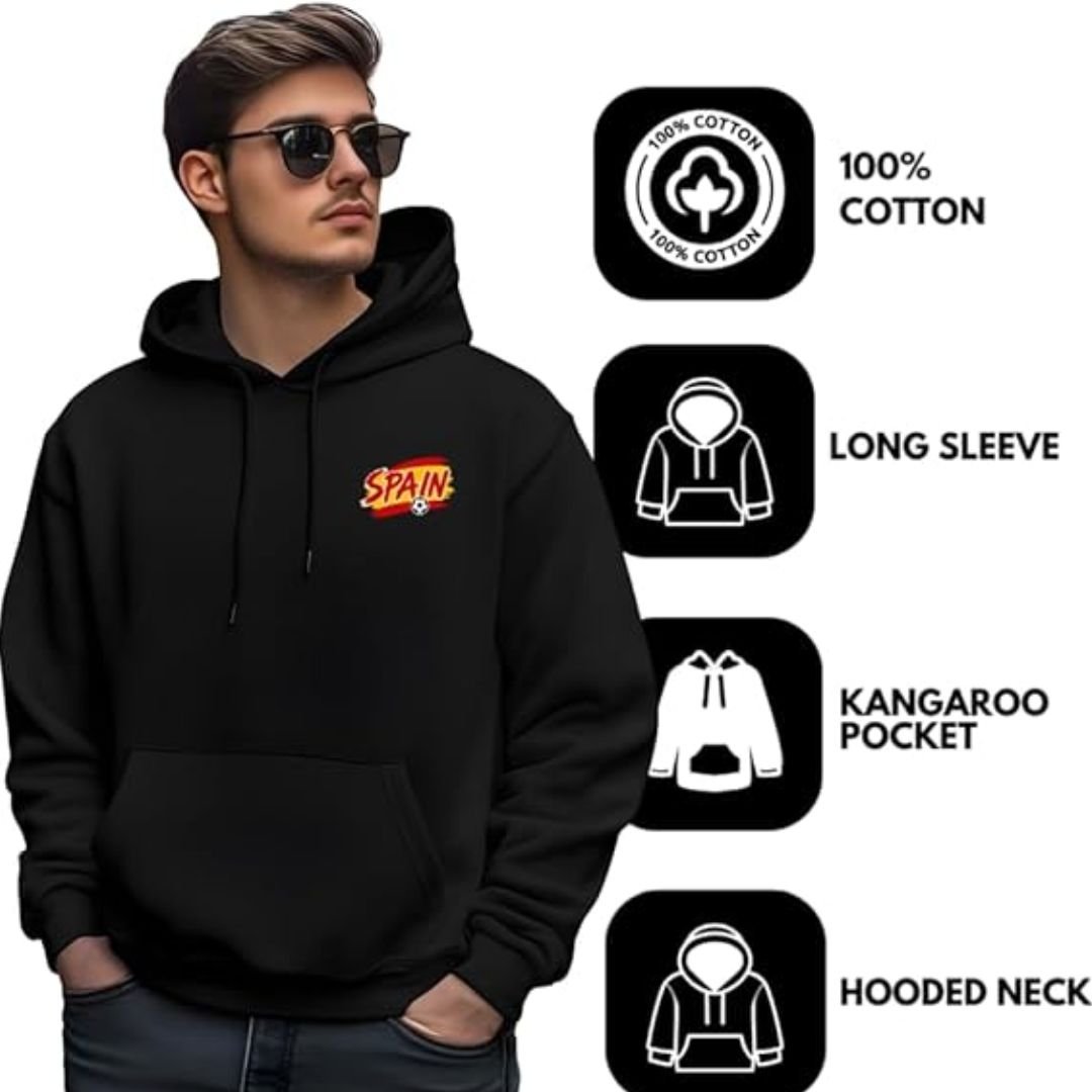 Long sleeve sports hoodie - printshop4me.ae "Black Spain football hoodie featuring 100% cotton fabric, long sleeves, kangaroo pocket, and hooded neck, shown on male model with sunglasses."