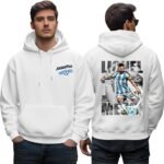 Soccer theme pullover - printshop4me.ae Front and back view of a white men's hoodie featuring an Argentina 2026 logo on the chest and a full-color graphic of Lionel Messi kicking a soccer ball on the back. The model is standing straight, with hands in pockets, wearing jeans.