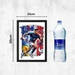 France football player photo frame size comparison image showing 21 x 30 cm wall frame with soccer player artwork beside a 1-liter water bottle for scale reference.