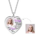 Personalized heart-shaped memorial photo necklace featuring a custom portrait, engraved remembrance message, and silver pendant design. A meaningful sympathy keepsake jewelry gift to remember a loved one for special memorial occasions.