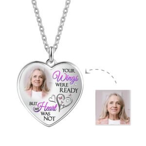 Personalized heart-shaped memorial photo necklace featuring a custom portrait, engraved remembrance message, and silver pendant design. A meaningful sympathy keepsake jewelry gift to remember a loved one for special memorial occasions.