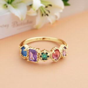 Elegant gold birthstone ring featuring five colorful gemstones in mixed shapes and sizes, including blue, purple, green, pink, and lavender stones in a vintage-inspired setting. This personalized family birthstone ring symbolizes loved ones and makes a meaningful gift for mothers, wives, grandmothers, birthdays, anniversaries, Mother's Day, and special occasions.