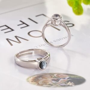 Personalized projection photo ring in polished silver featuring a hidden custom photo gemstone that projects a cherished image. The adjustable ring showcases a sleek minimalist design with a round projection stone, making it a meaningful keepsake gift for couples, anniversaries, weddings, Valentine's Day, birthdays, and special occasions.