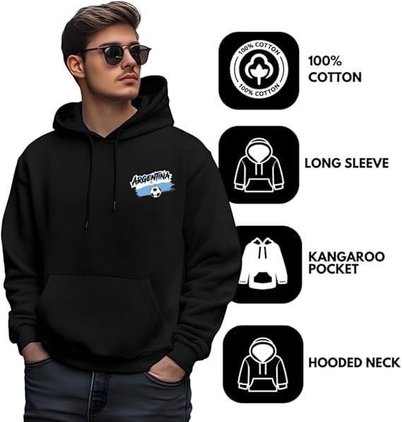 Travel hoodie men - printshop4me.ae Front and back view of a men's black hoodie featuring "Argentina 2026" printed on the front left chest and a large colorful Argentina soccer-themed graphic with Lionel Messi on the back. The hoodie has a drawstring hood and kangaroo pocket, modeled by a man standing in a stadium.