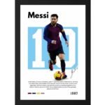 Lionel Messi poster showing him in Barcelona kit dribbling a football with number 10 in background, framed in black. Includes a brief biography mentioning his career, Ballon d'Or wins, and 2022 World Cup victory.